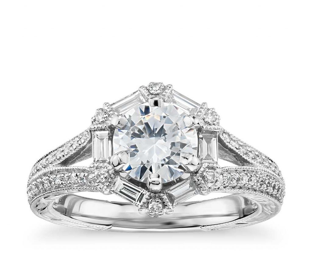 Round diamond ring with baguette accents